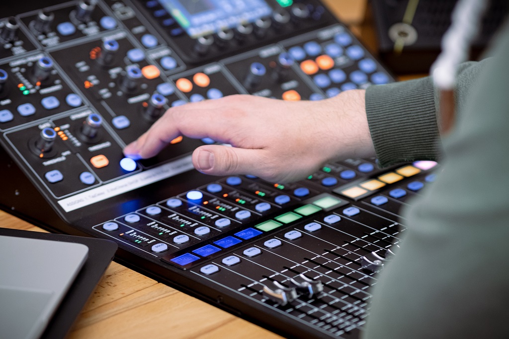 an audio mixing console used to enhance audio quality
